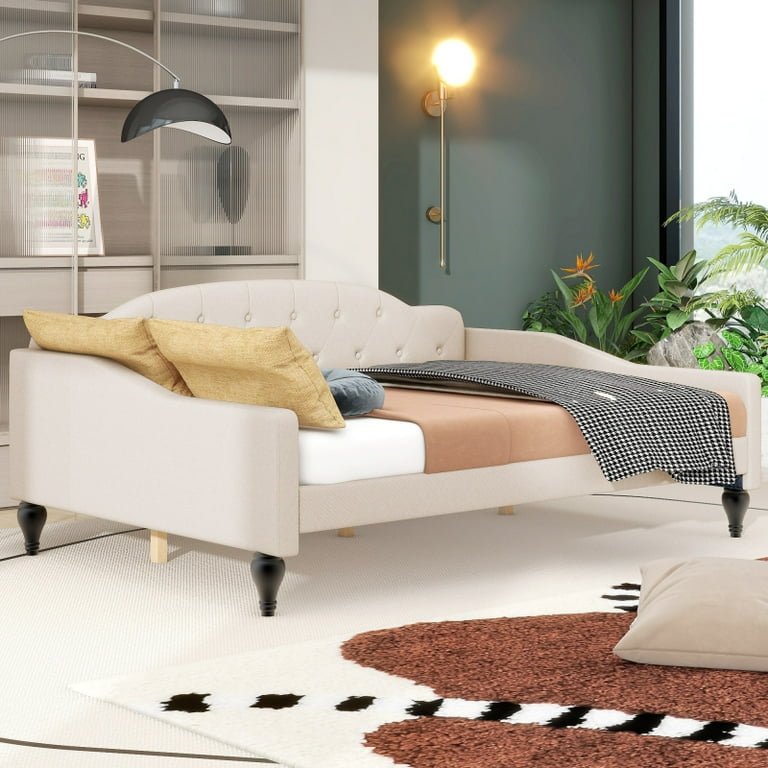 Full-size upholstered sofa daybed – beige tufted cushions